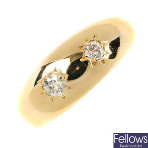 A 1930s 18ct gold diamond two-stone ring.