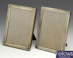 A pair of 1920's silver photograph frames & a later singular frame.