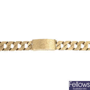 A 9ct gold curb-link identity bracelet.