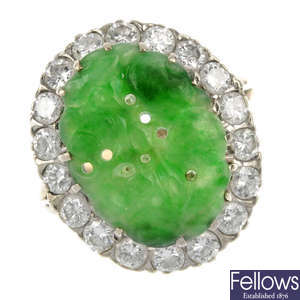 A mid 20th century 18ct gold jade and diamond cluster ring.