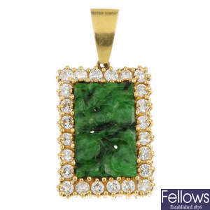 A jade and diamond cluster pendant.