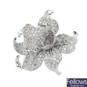 A diamond floral dress ring.