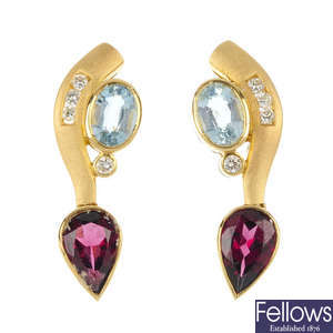A pair of 18ct gold aquamarine and garnet earrings. 