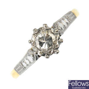 A diamond single-stone ring and 9ct gold diamond cross pendant.