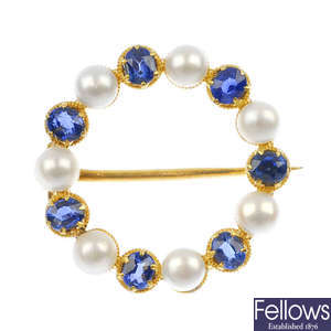 A sapphire and seed pearl wreath brooch. 