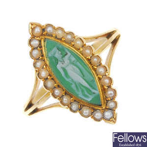 An Edwardian 18ct gold hardstone cameo and seed pearl cluster ring.