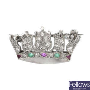 A mid 20th century diamond, ruby and emerald Naval Crown brooch.