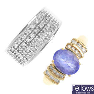 A tanzanite and diamond dress ring and a diamond band ring. 