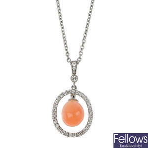 A conch pearl and diamond pendant.