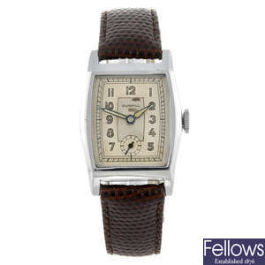 DUNHILL - a gentleman's wrist watch together with a Hilton wrist watch.