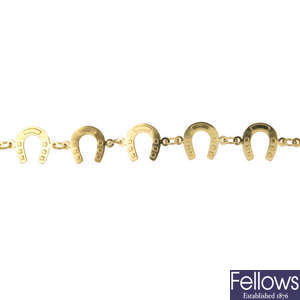 A 1970s 9ct gold horseshoe bracelet.