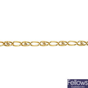 An early 20th century 18ct gold diamond foliate bracelet. 