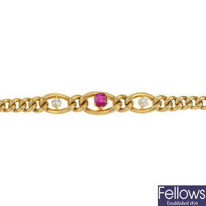 A diamond and ruby three-stone bracelet.