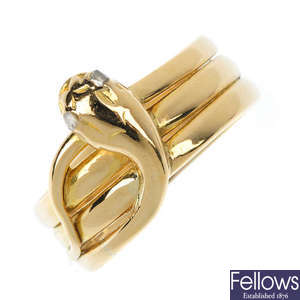 An 18ct gold diamond snake ring.
