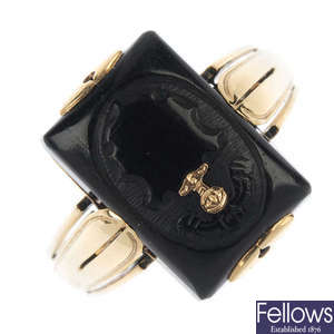 A late 19th century gold onyx mourning ring.