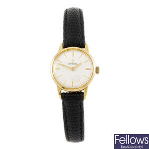 OMEGA - a lady's wrist watch. 