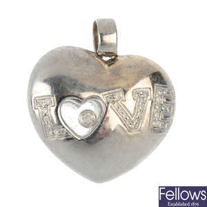 An 18ct gold diamond 'Love' heart pendant.