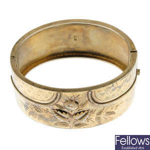 A late Victorian silver hinged bangle.