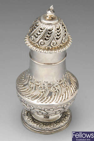 A late Victorian large silver caster.