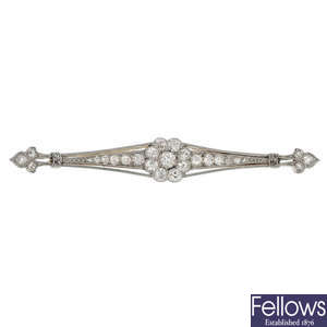An early 20th century platinum and 18ct gold diamond bar brooch.