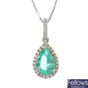 An 18ct gold emerald and diamond cluster pendant.
