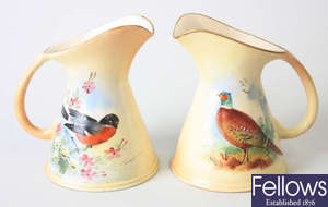 A pair of Locke & Co. Worcester porcelain jugs