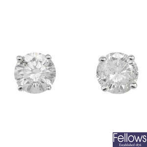 A pair of 9ct gold brilliant-cut diamond single-stone ear studs.