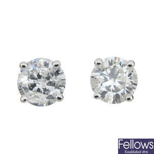 A pair of 18ct gold brilliant-cut diamond ear studs.