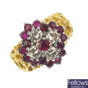 A mid 20th century 18ct gold ruby and diamond cluster ring.