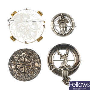 A selection of four brooches.