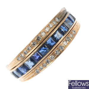 A sapphire, emerald and diamond full-circle eternity ring.