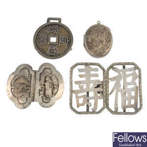 A selection of buckles and lockets.