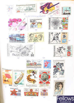 A box containing a mixed selection of assorted stamps