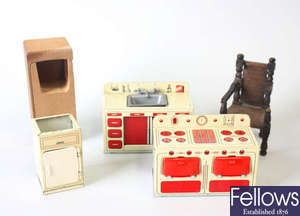 A box containing a good mixed selection of 1930's and later wooden dolls house furniture