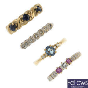A selection of seven 9ct gold diamond and gem-set rings.
