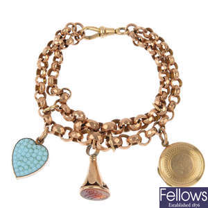 A bracelet with locket, paste heart pendant and fob seal.