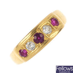 An early 20th century 22ct gold ruby and diamond five-stone ring.