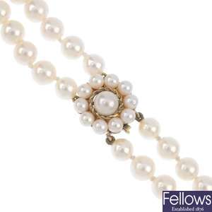 A gold cultured pearl two-row necklace.
