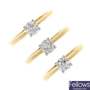 A selection of three 18ct gold diamond single-stone rings. 
