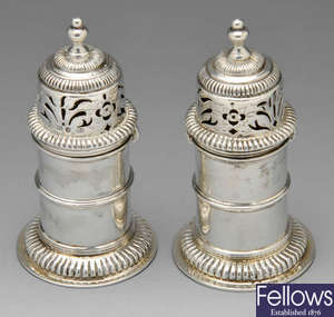 A pair of Victorian silver peppers.