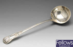 A Victorian silver King's Pattern soup ladle.