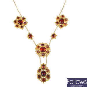 A mid 19th century gold garnet necklace.