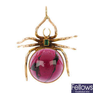A late 19th century 9ct gold emerald and garnet spider pendant.