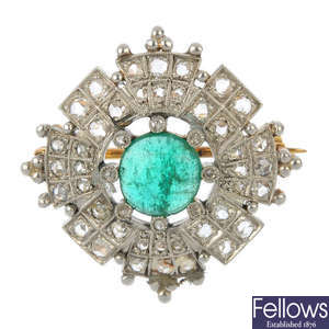 An early 20th century silver and 9ct gold emerald and diamond brooch.