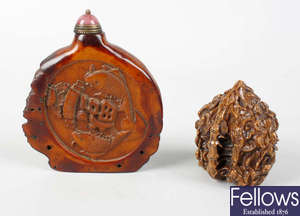 An Oriental horn scent bottle, plus a carved walnut