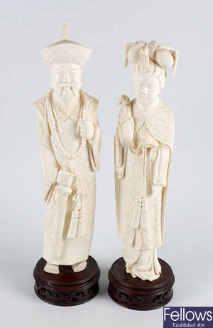 A fine large pair of early 20th century Chinese carved ivory figures