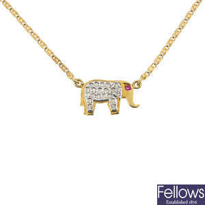 A diamond elephant pendant and chain.