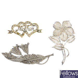 A selection of silver and white metal jewelllery, to include a marcasite brooch.