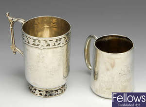 A Victorian silver christening mug & a later example.