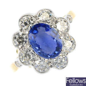 A sapphire and diamond floral cluster ring.